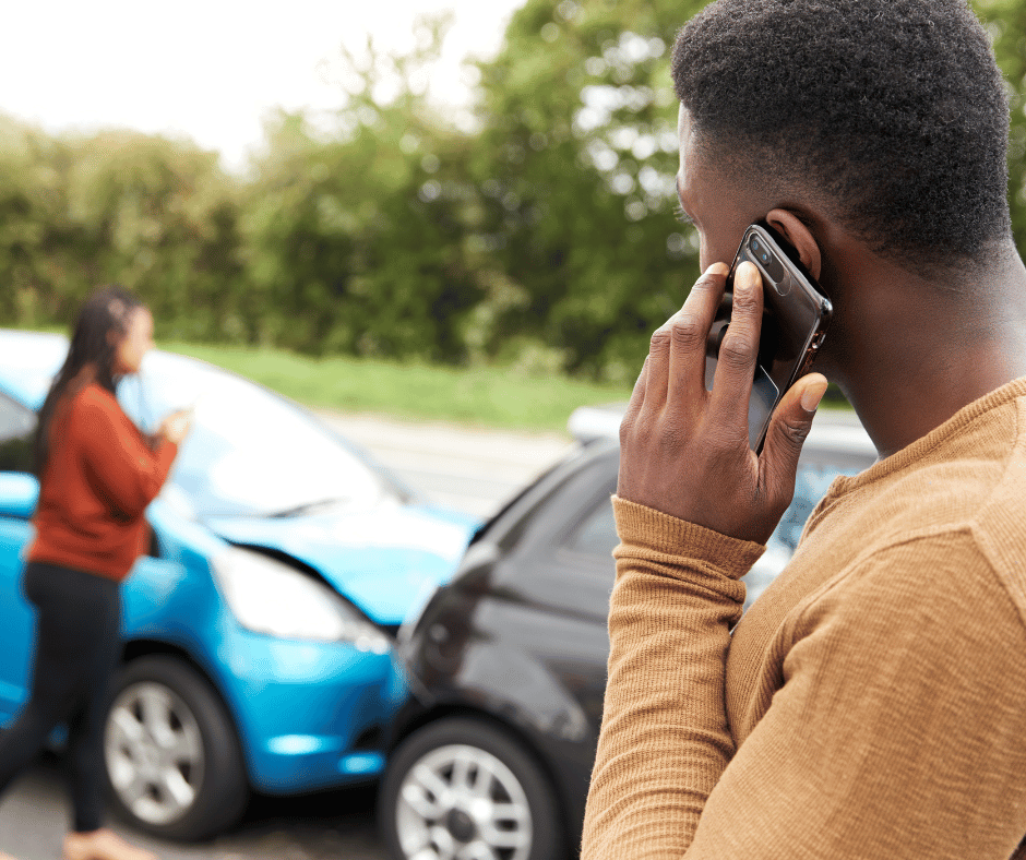 parties involved in car accident recording data and reporting crash on phone